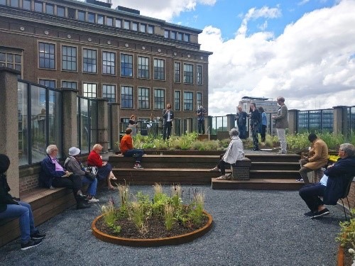 Innovativa åtgärder Andra ansökningsomgången.Illustration av människor, byggnader och stadsgrönska. Foto: EUI.
