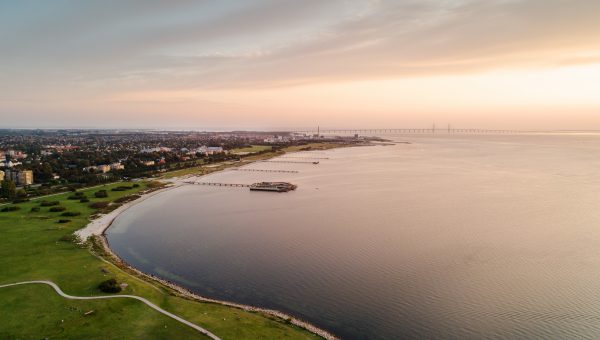 Vad kan du få stöd för genom klimatklivet? Utsikt över hav, himmel, Öresundsbron, Malmö i halvdis