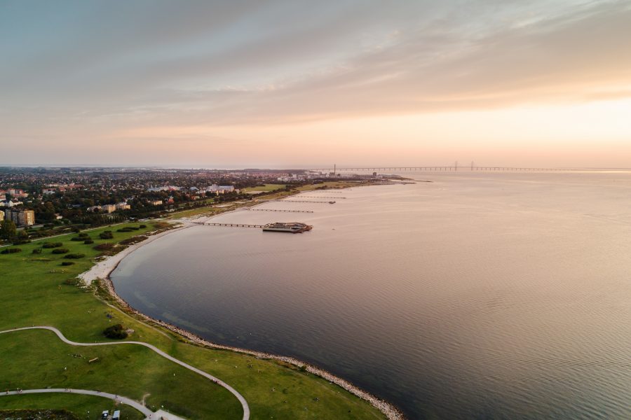 Vad kan du få stöd för genom klimatklivet? Utsikt över hav, himmel, Öresundsbron, Malmö i halvdis